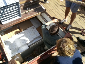 Roxforth's Sune unloads his wine from the cargo hold